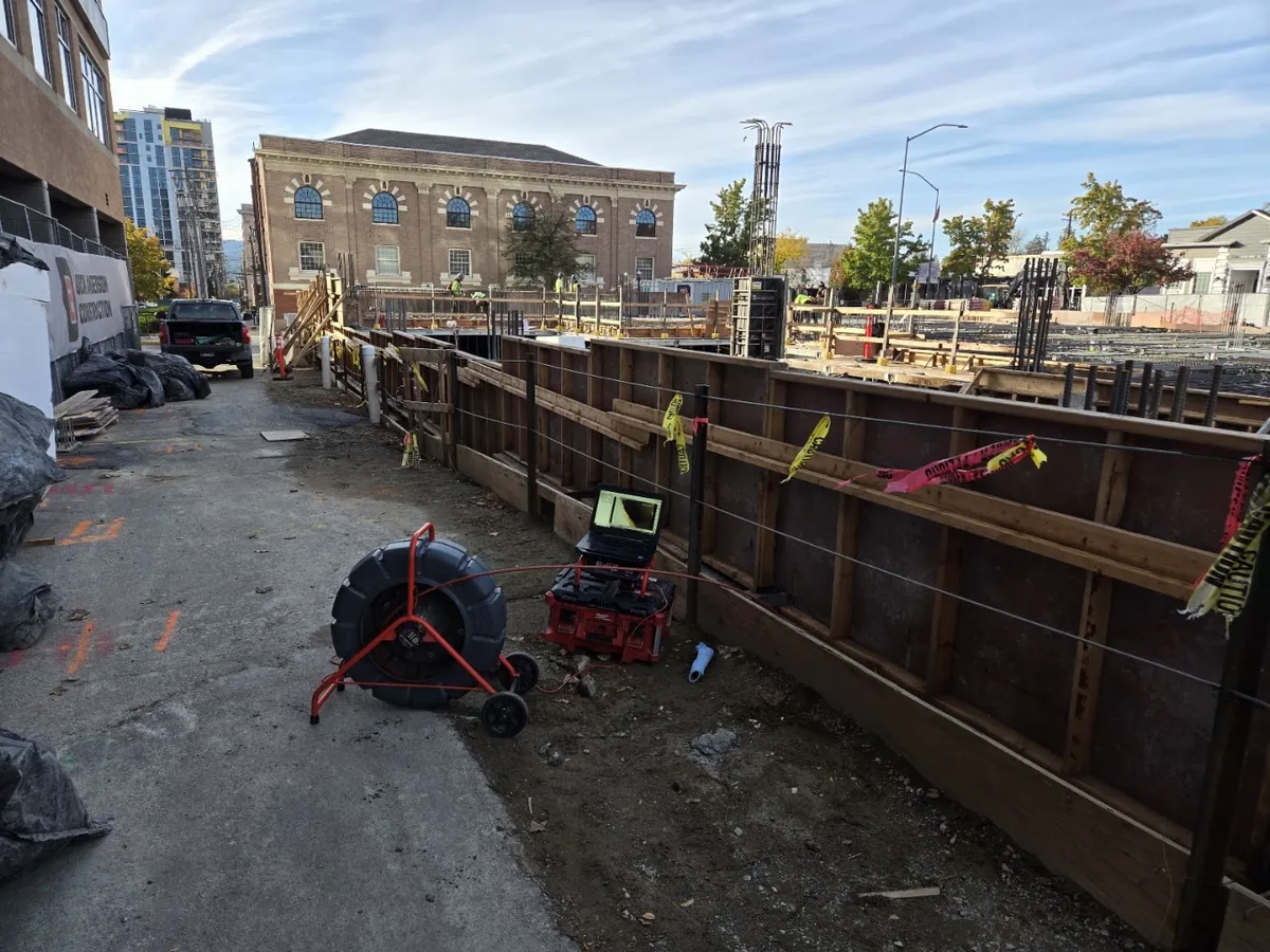Sewer camera inspection at a downtown commercial construction site